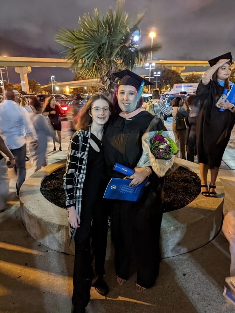 Lauren celebrating her Master of Public Health graduation with her daughter
